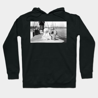 Baby and dog on large boat Hoodie
